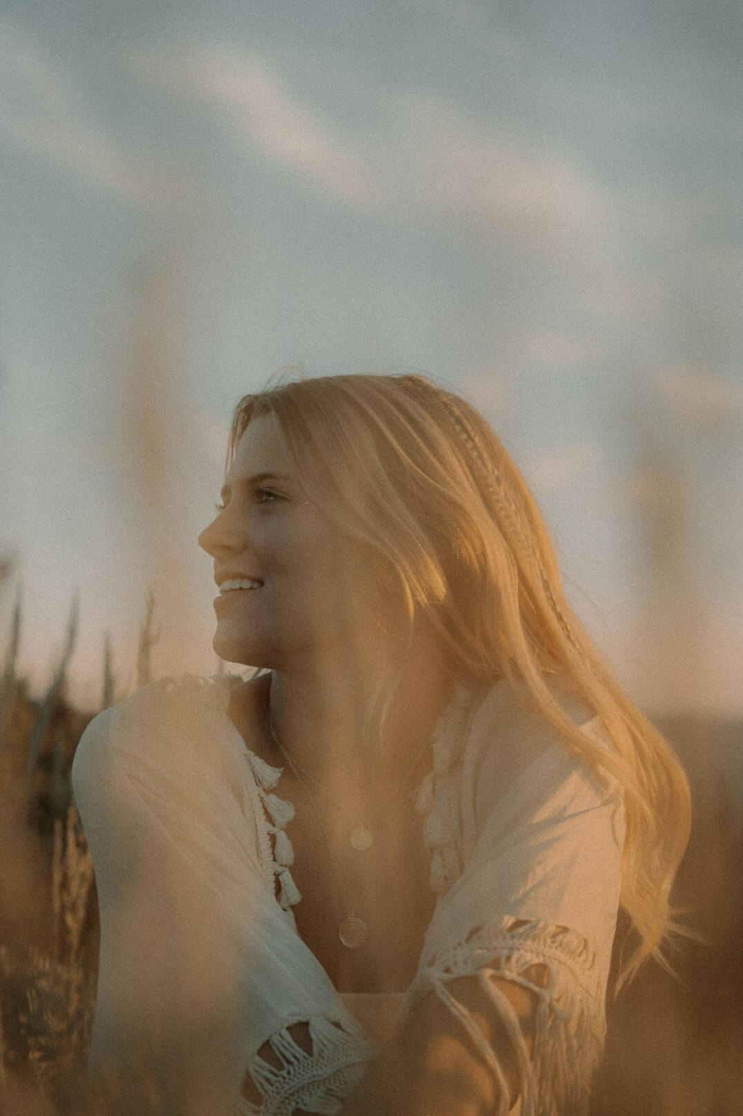 Portrait of a smiling woman with long hair